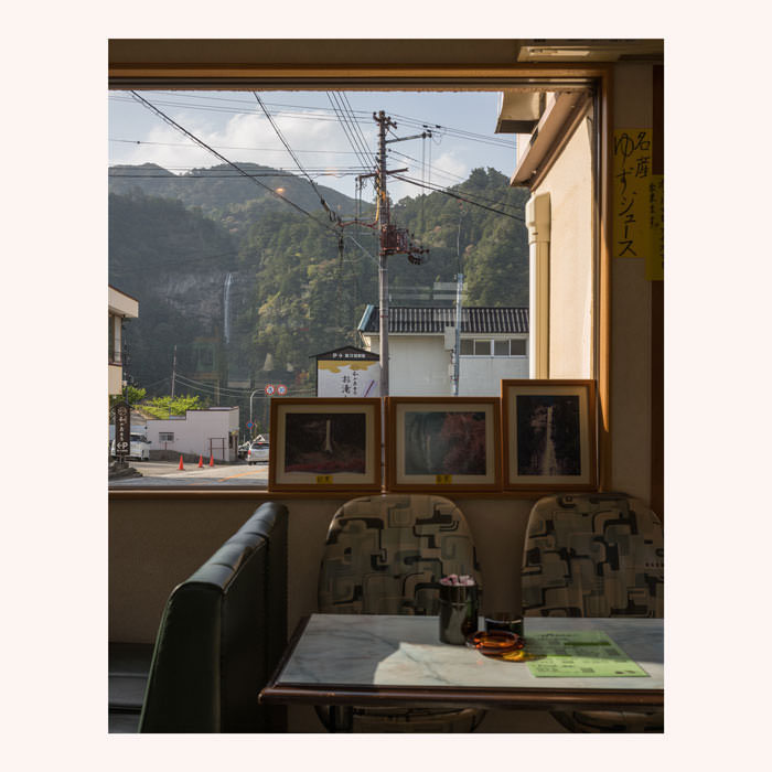 A cafe with a waterfall view