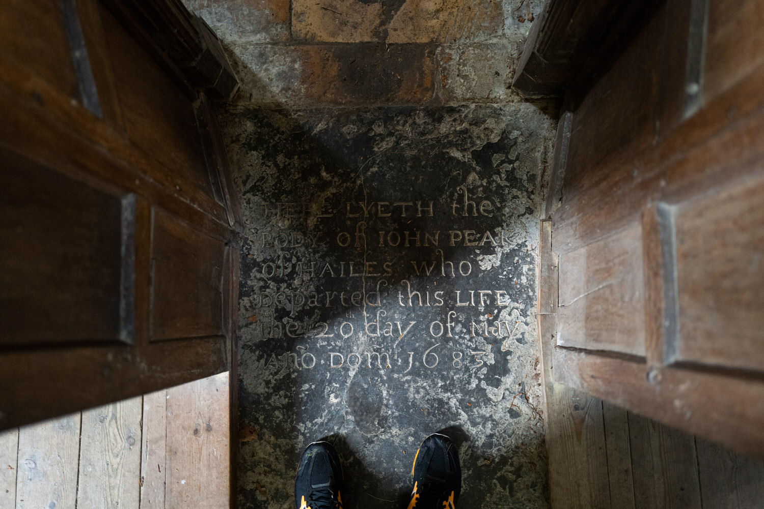 standing on old grave in old church